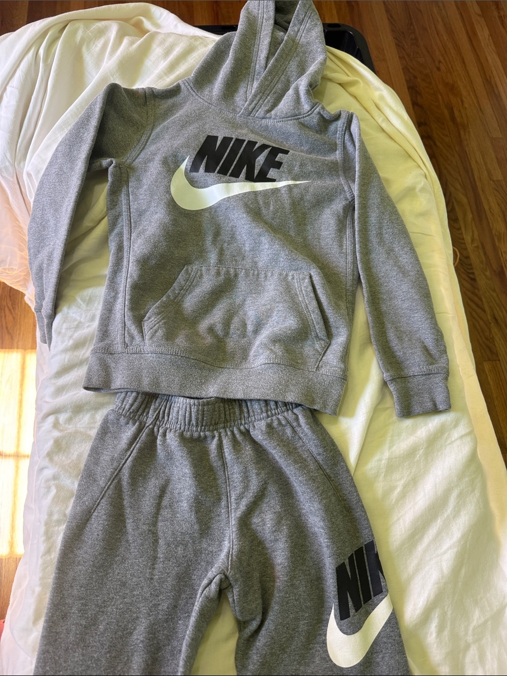 Kids Nike Gray Pullover Hoodie and Jogger Set with White Swoosh